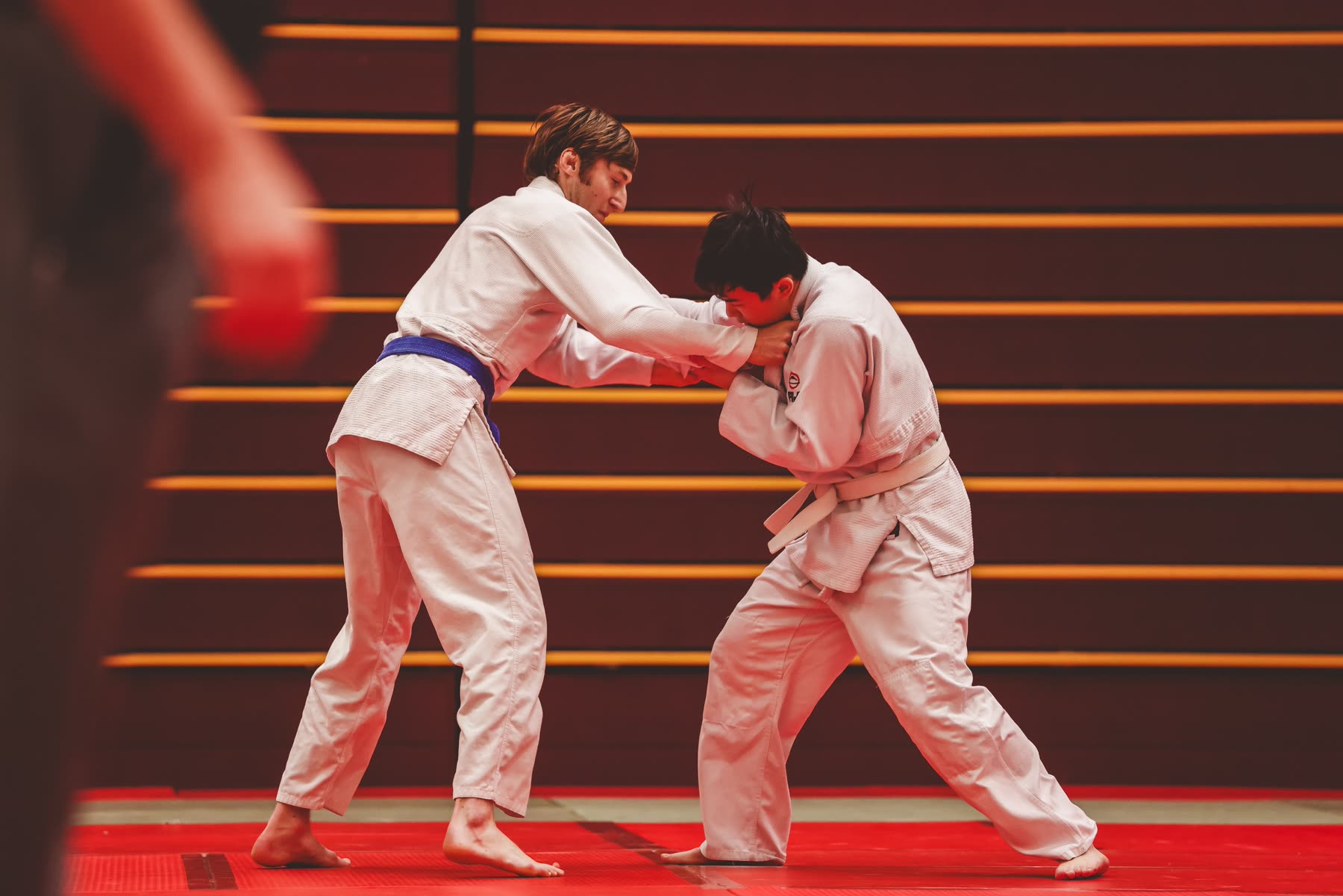 A Kensei student and her father bowing together before training